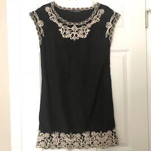 Twenty-one black dress with white embroidery